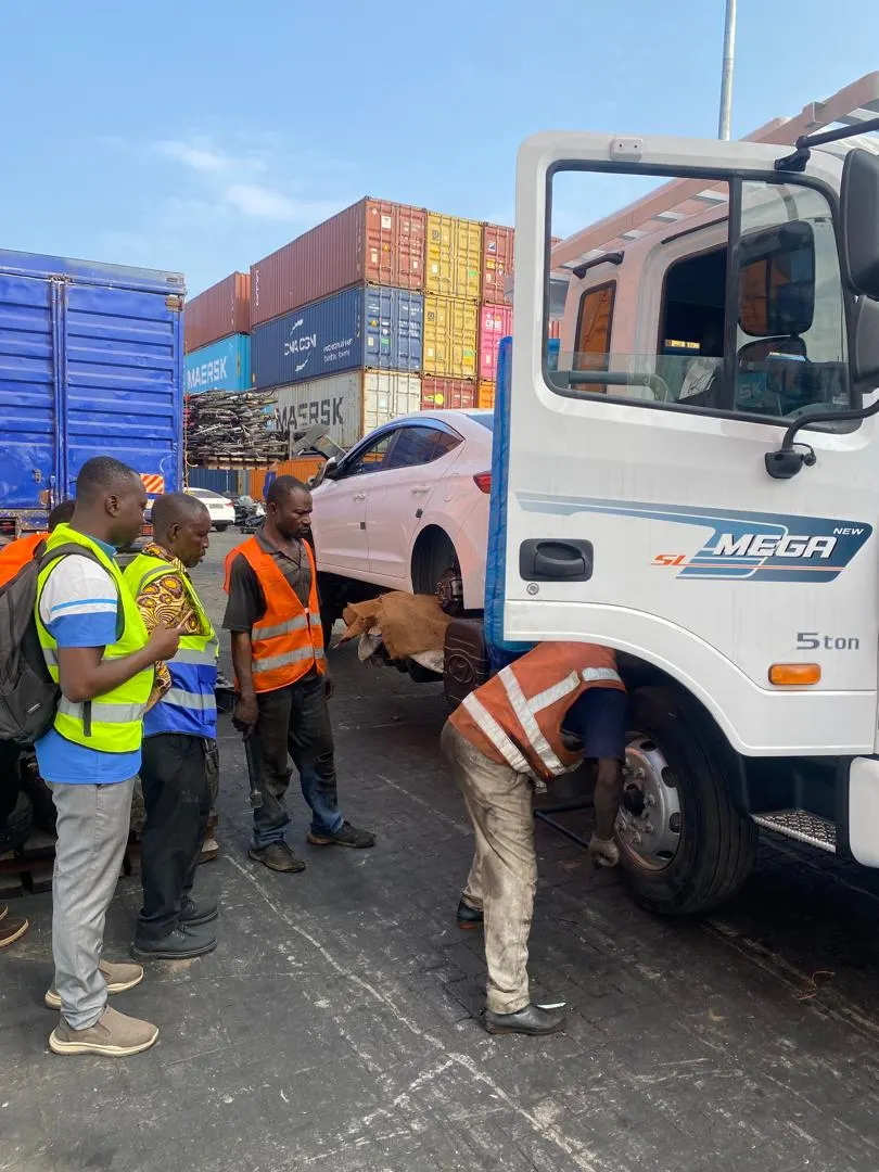 A SmartLink Auto customer collecting their car at Tema Port