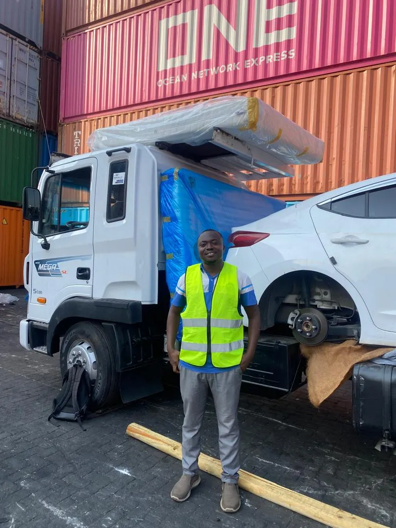 A SmartLink Auto customer collecting their car at Tema Port