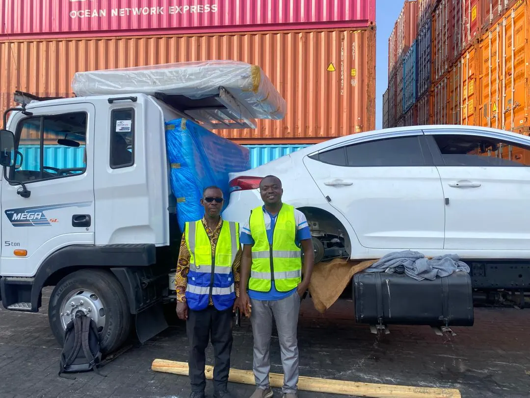 A SmartLink Auto customer collecting their car at Tema Port
