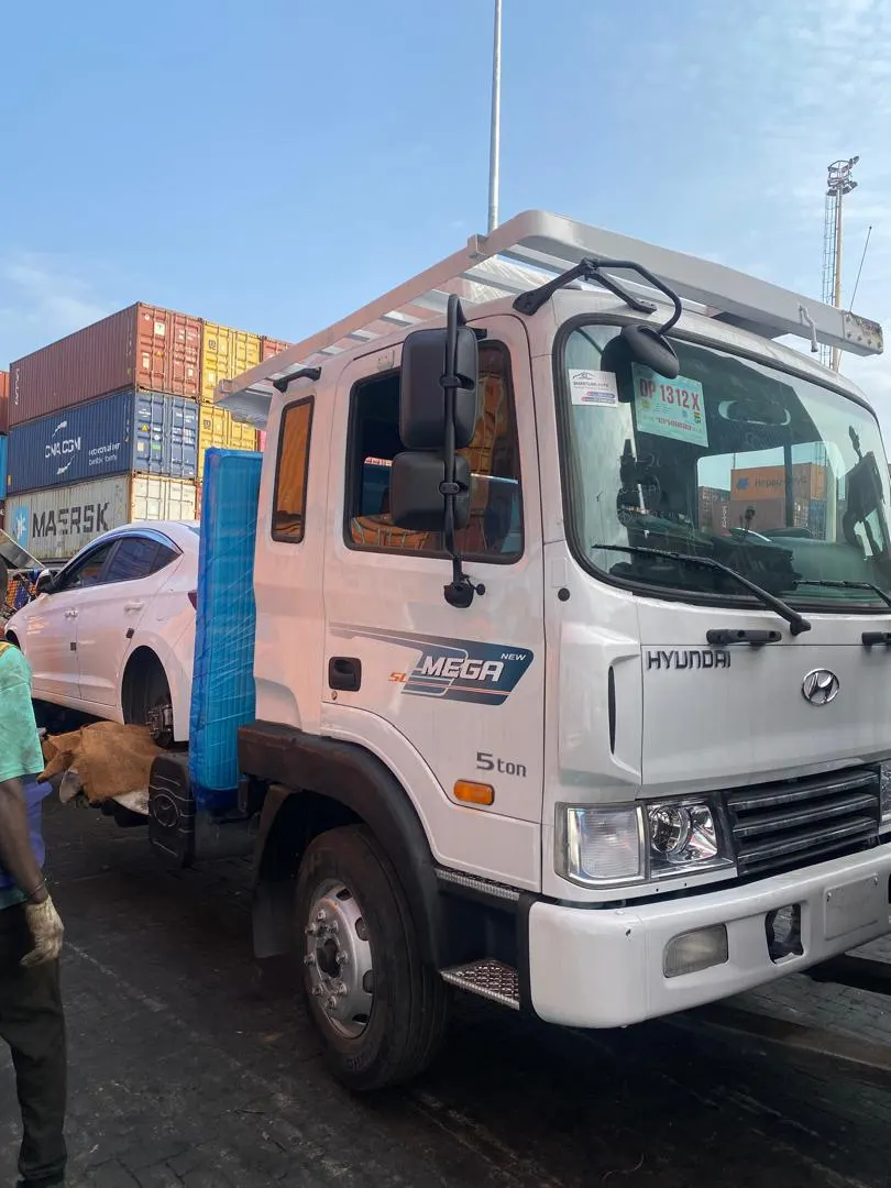 A SmartLink Auto customer collecting their car at Tema Port
